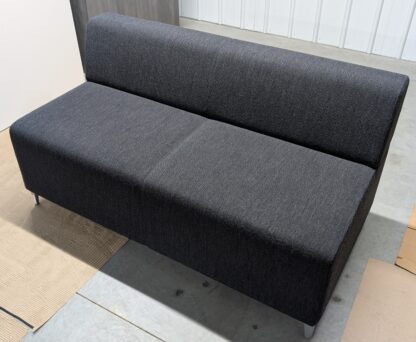 Stylex Dark Grey Fabric Armless Loveseat - Used