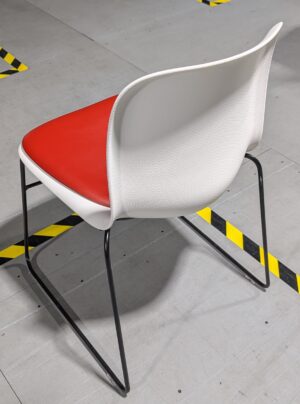 Alternative view of Howe SixE White Plastic Red Vinyl Padding Black Frame Stack Chairs - Used