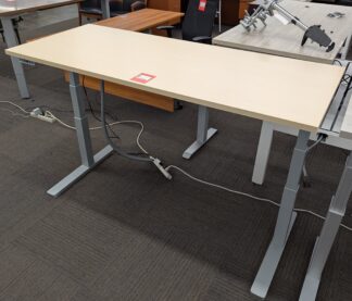 Teknion 28"x69" Maple/Silver Electronic Height Adjustable Table - Used