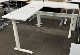White Laminate 6'x5.5' L-Shaped Electronic Height Adjustable Desk - Used