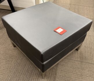 Black Leather Ottoman w/ Silver Post Legs - Used